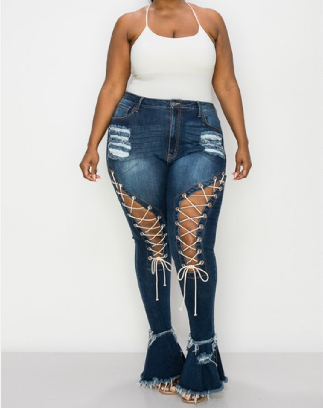 Flirty" dark denim flare leg jeans with cutouts